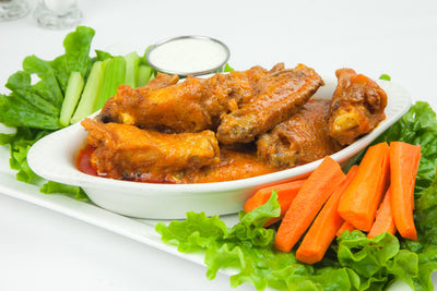 Buffalo Wings with celery and ranch at California Grill & Bar in Whittier