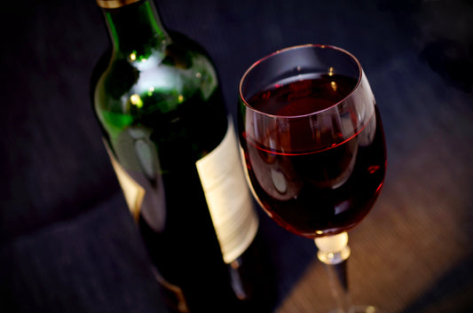 Glass and bottle of red wine