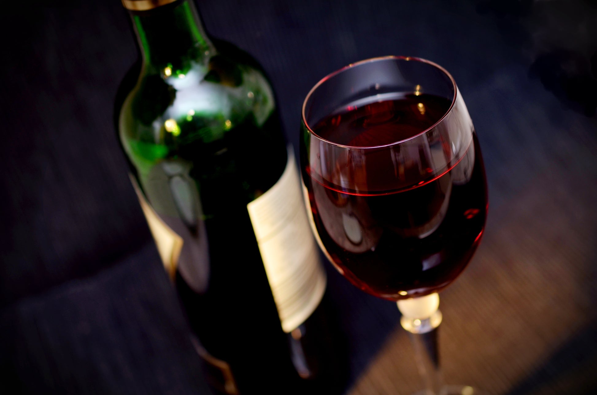 Glass and bottle of red wine