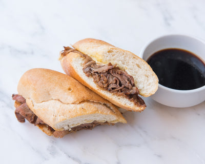 French Dip Sandwich with au jus at California Grill & Bar in Whittier